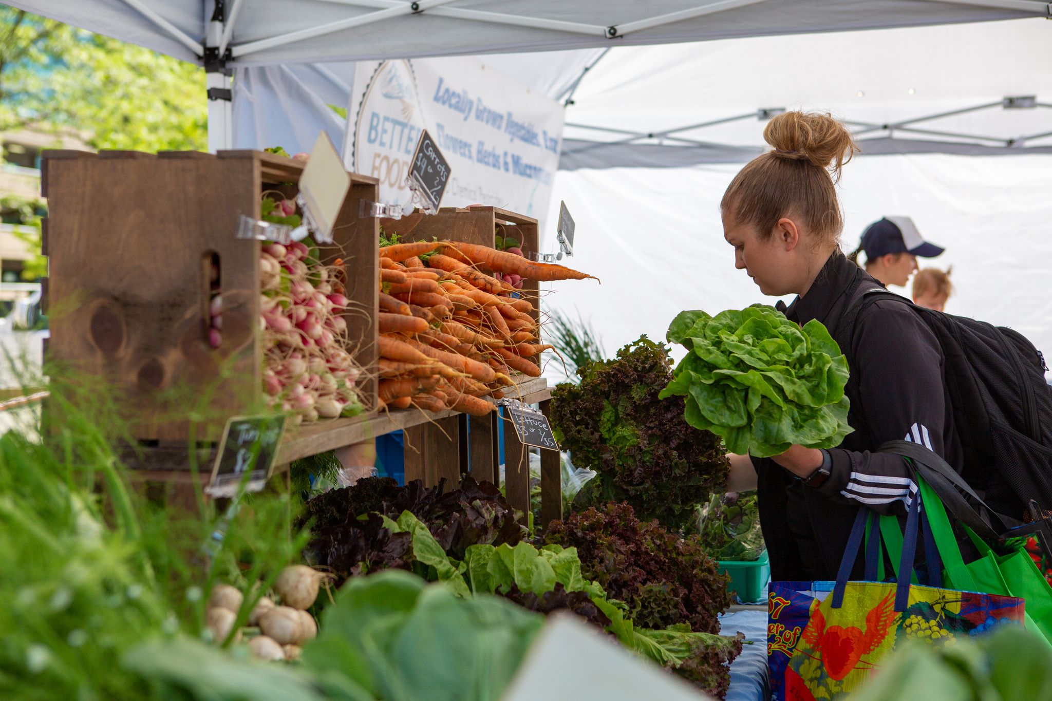 Woman buying produce